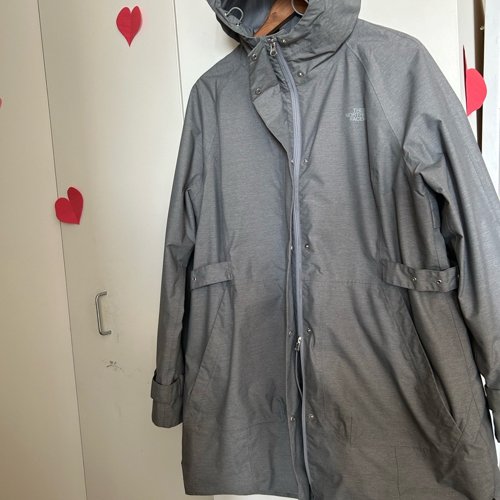 Women’s North Face Antora Parka: hooded, waterproof, wind protection cinch hood.